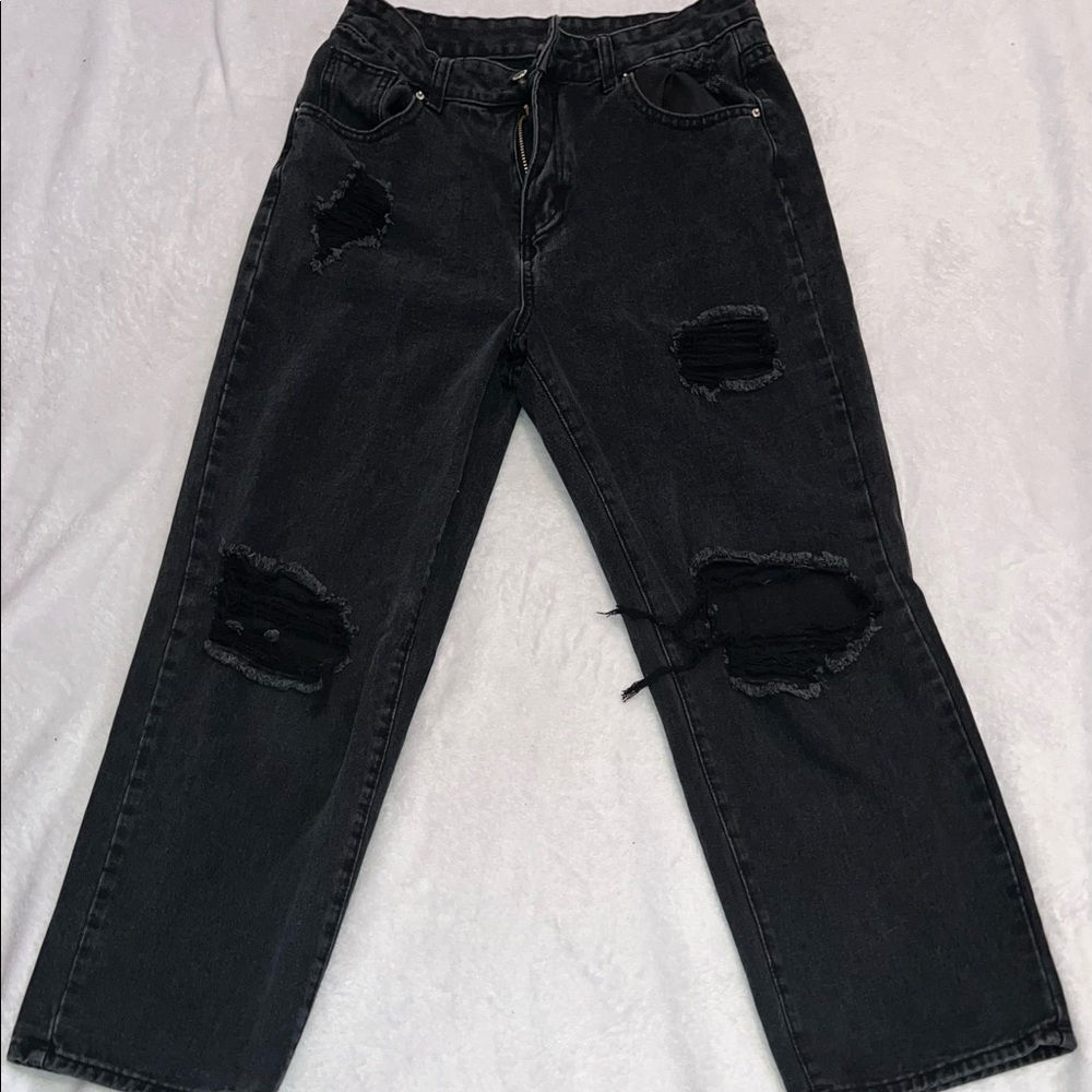 Woman’s wide leg black ripped jeans size L